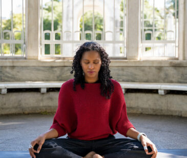 Erika Johanna Iluszko - Manas Yoga Studio owner in meditative pose