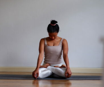 Erika Johanna Iluszko - Manas Yoga Studio owner in Maha Bandha pose